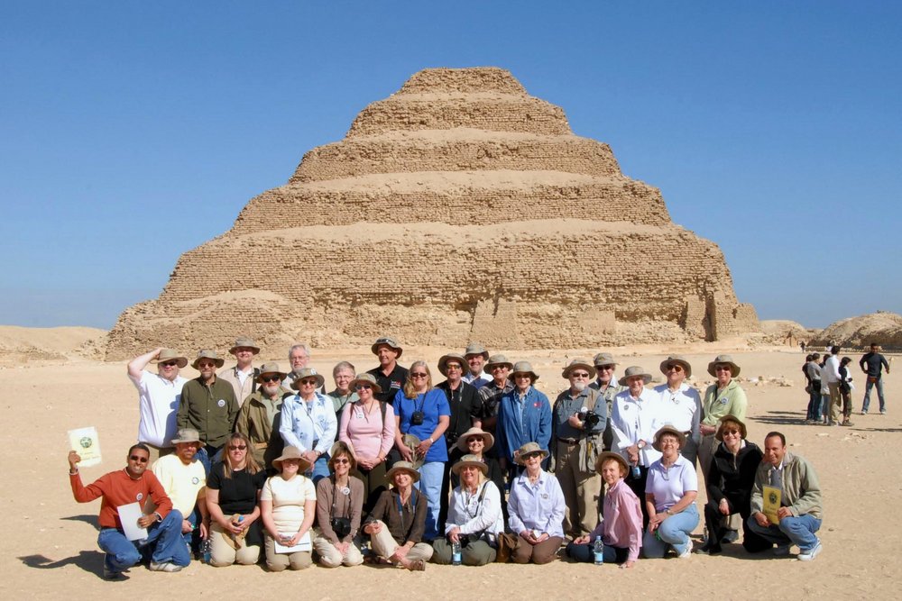 group posing outside pyramid