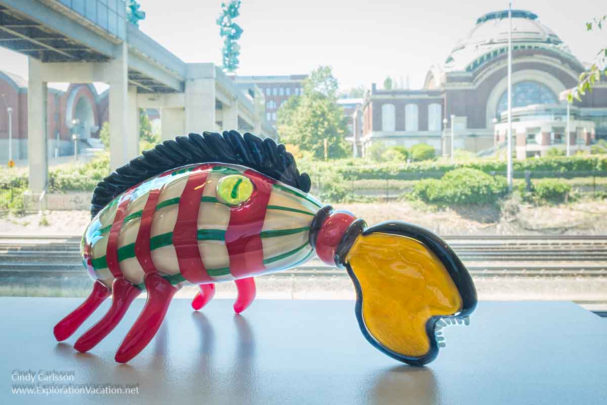 Photo of an imaginary lioncrab designed by a child and created from glass at the Museum of Glass in Tacoma, Washington in July 2023 &copy; Cindy Carlsson at ExplorationVacation.net