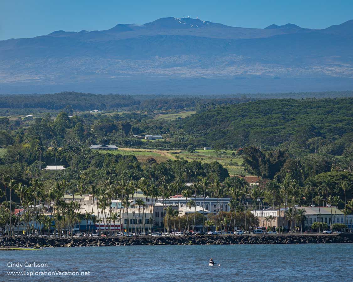 Photo of a portion of old Hilo with Mauna Kea in the background (Photo &copy; Cindy Carlsson at ExplorationVacation.net)