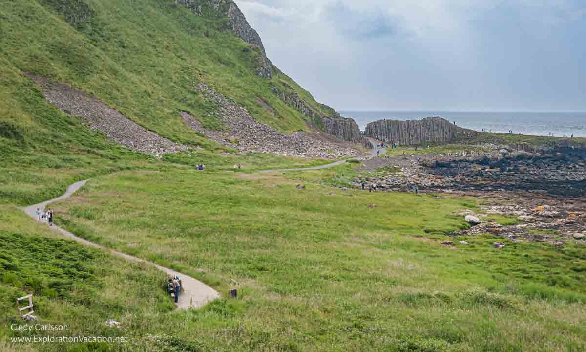 photo of walkway and Giant's Gate at the Giant's Causeway UNESCO World Heritage site in Northern Ireland © Cindy Carlsson - ExplorationVacation.net
