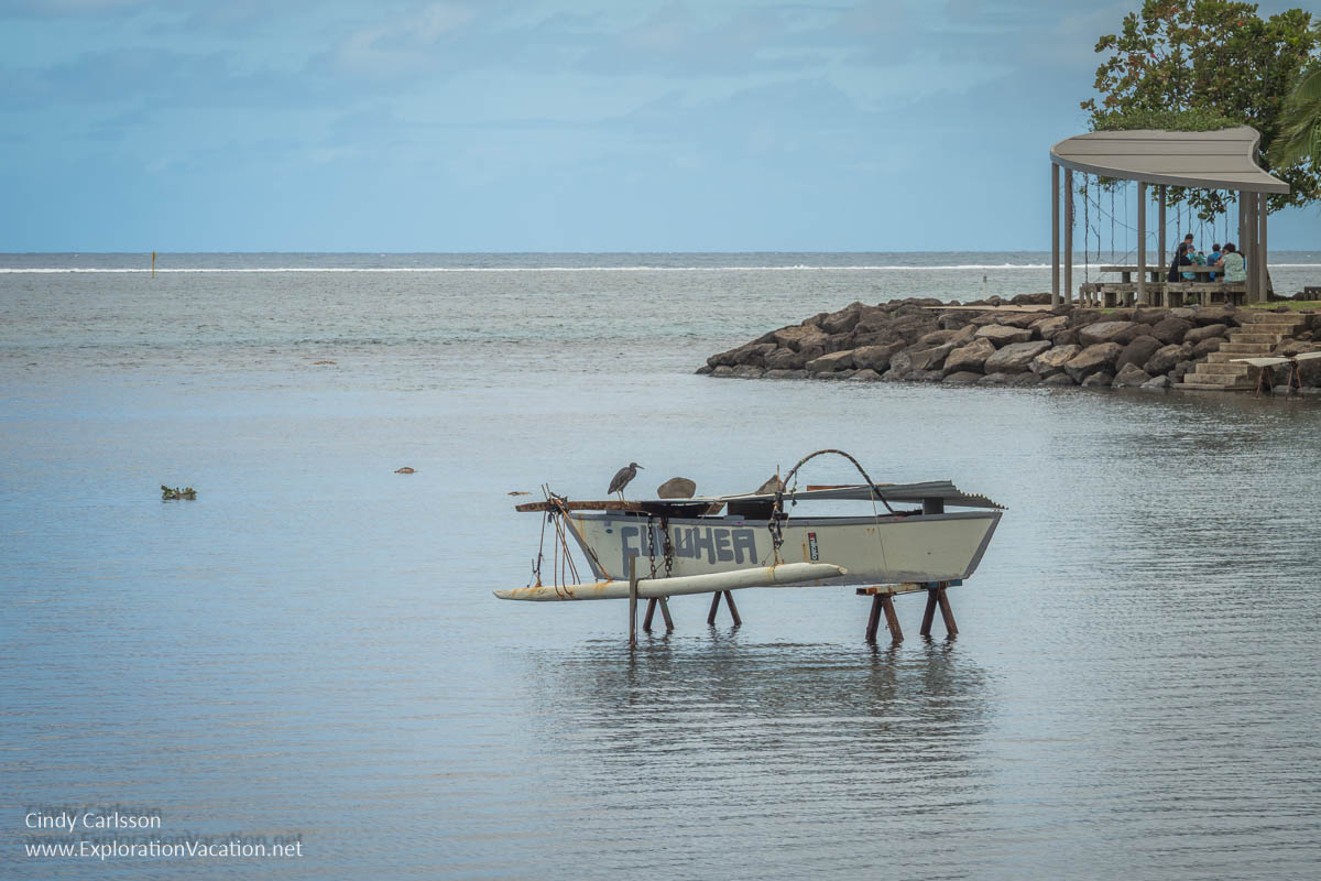 photo of an outrigger fishing boat in Matavai Bay at Point Venus on Tahiti in French Polynesia &copy; Cindy Carlsson at ExplorationVacation