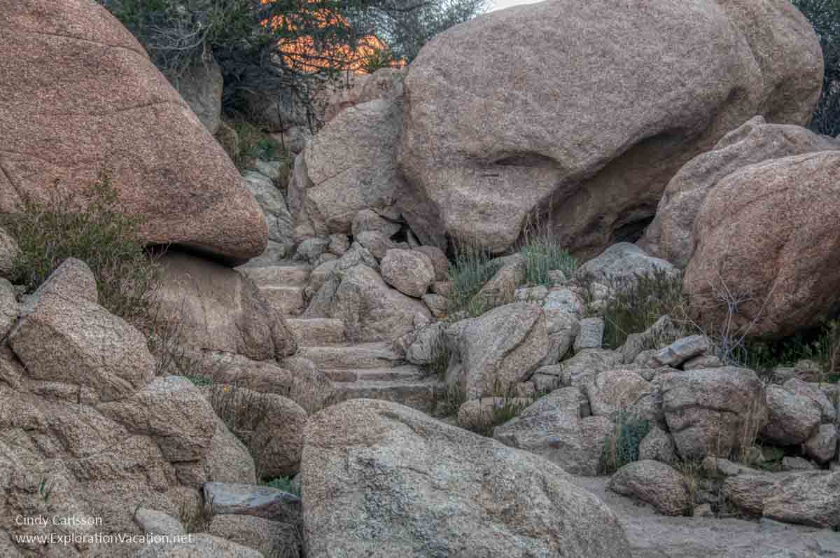 carved stone stairs between and over boulders