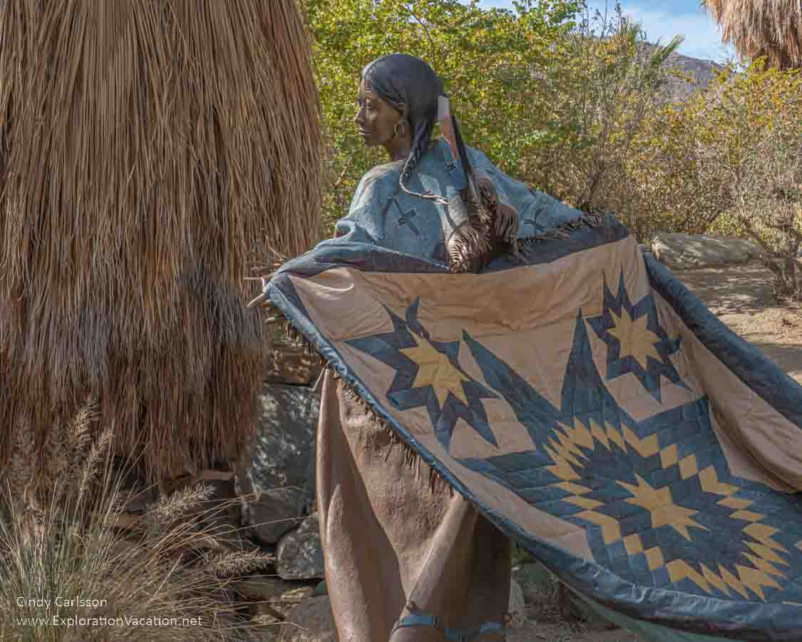 A life-size sculpture of a Native American woman by Dave McGary in Palm Desert.