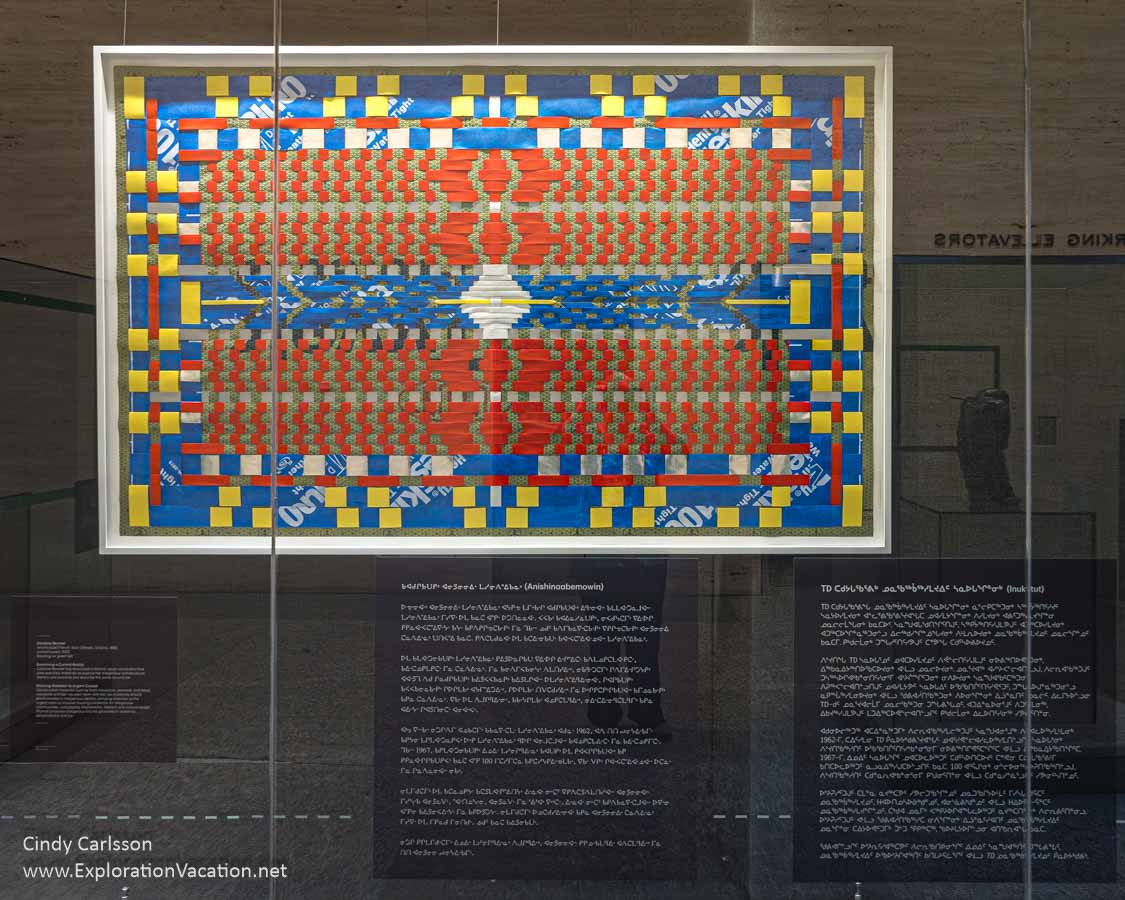 Photo of a weaving using recycled items by Anishnaabe/French artist Caroline Monnet on display at the TD Gallery of Indigenous Art.