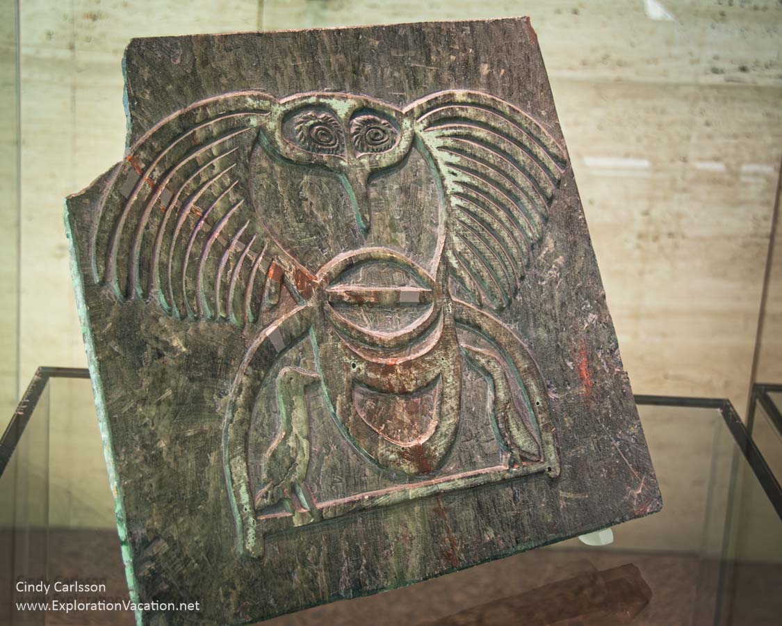 A printing stone from Cape Dorset of a stylized bird displayed at the TD Gallery of Indigenous Art.