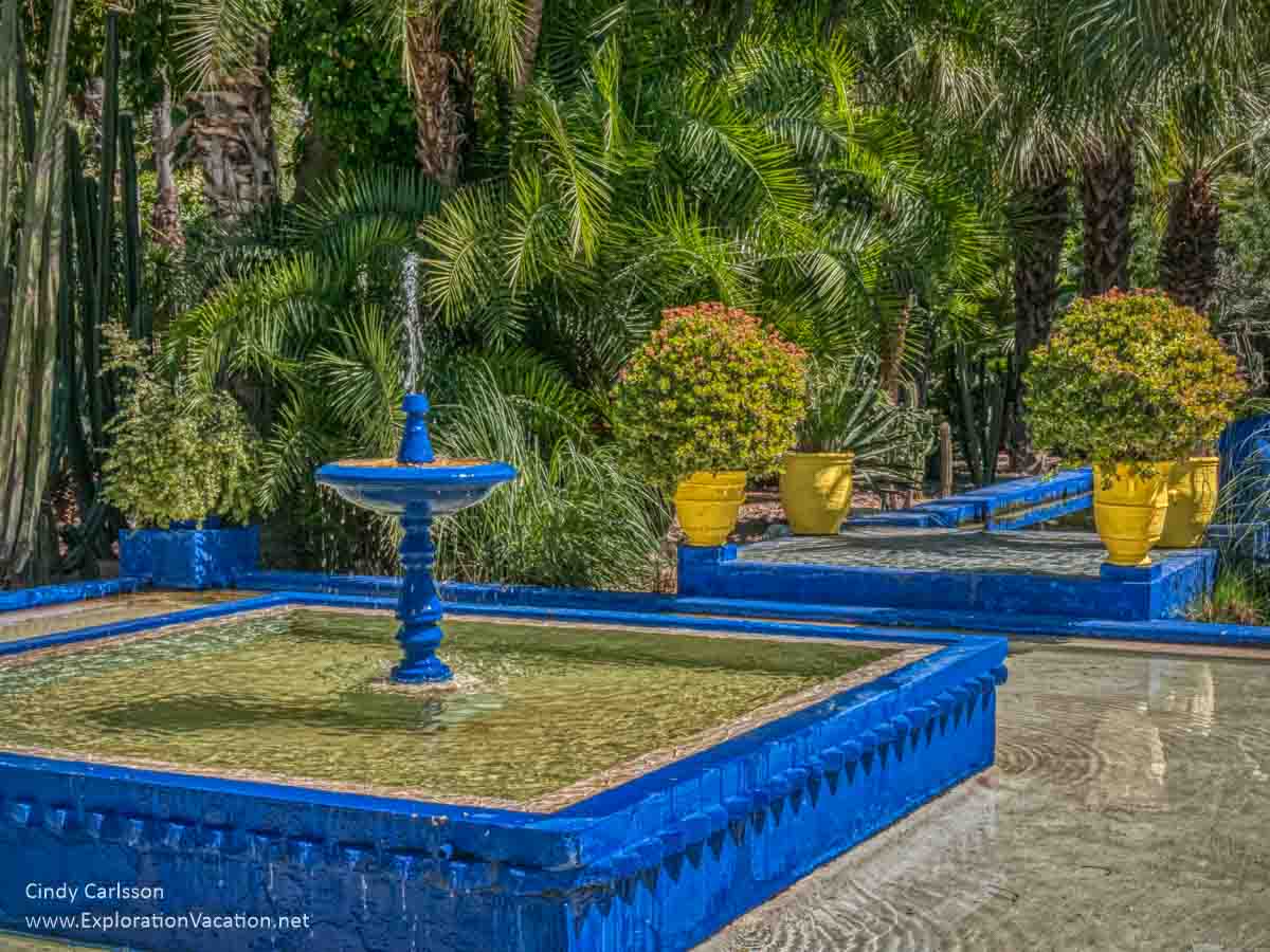 square pool with a fountain 