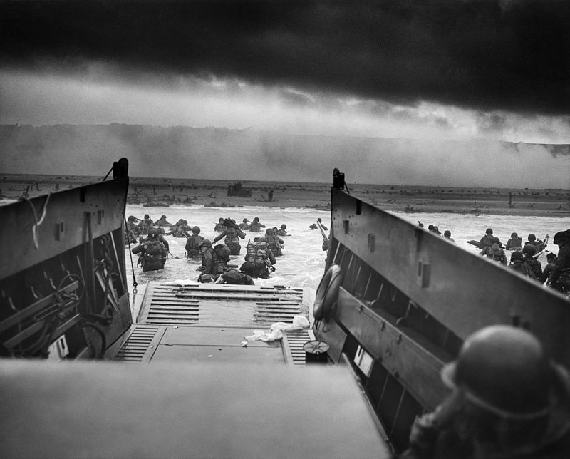 A landing craft from the U.S. Coast Guard-manned USS Samuel Chase disembarks troops onto Omaha Beach on the morning of June 6, 1944. Photo: Robert F. Sargent from the National Archives and Records Administration