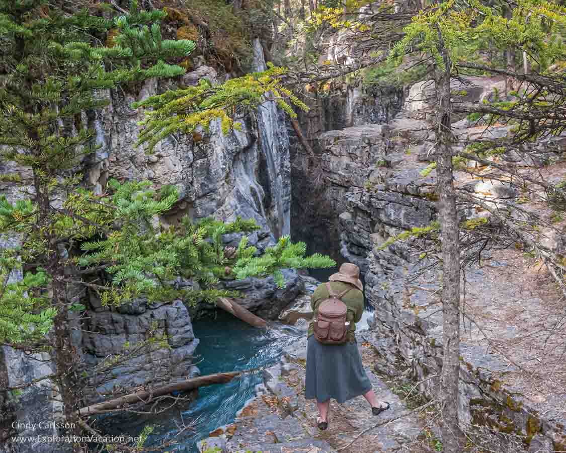 Photo of Cindy Carlsson photographing Beauty Creek in Jasper National Park, part of the Canadian Rocky Mountain Parks UNESCO World Heritage site &copy; Cindy Carlsson ExplorationVacation.net