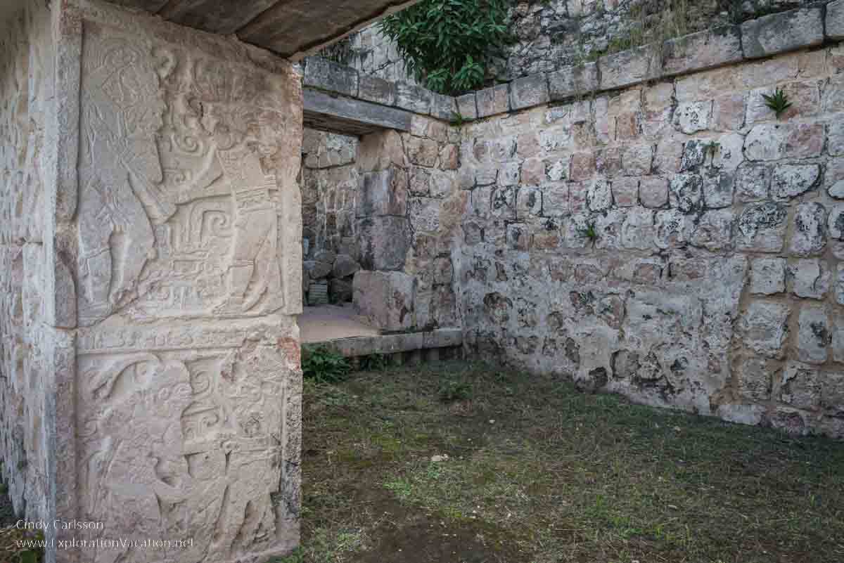 photo of carved narrative panels in the Codz Poop (Palace of the Masks) at Kabah Mexico, part of the Uxmal UNESCO World Heritage site © Cindy Carlsson at ExplorationVacation.net