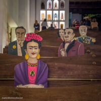 Photo of the cut-out “audience” of historic figures in the Chapel of Guadalupe at Xcaret park in Playa del Carmen, Mexico © Cindy Carlsson at ExplorationVacation.net