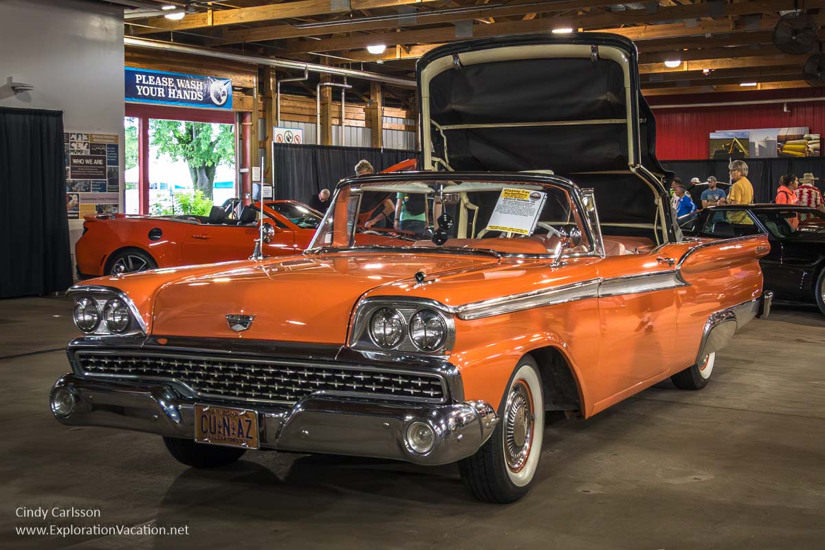 Photo of a classic mid-century convertible at an indoor car sale at Back to the 50s in Minnesota in 2024. (Photo &copy; Cindy Carlsson on ExplorationVacation.net)