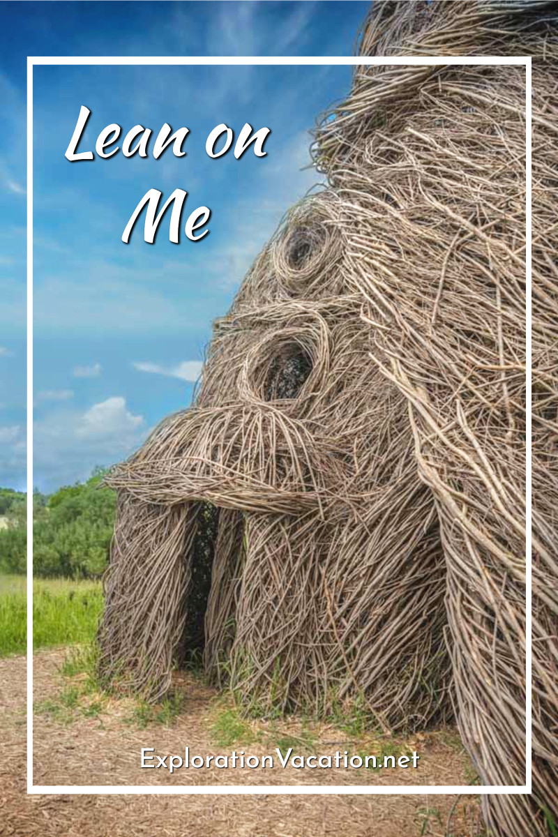 chapel-like stickwork structure with text "Lean on Me"