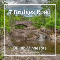 photo of historic stone bridge and waterfalls with text "7 Bridges Road, Duluth, Minnesota"