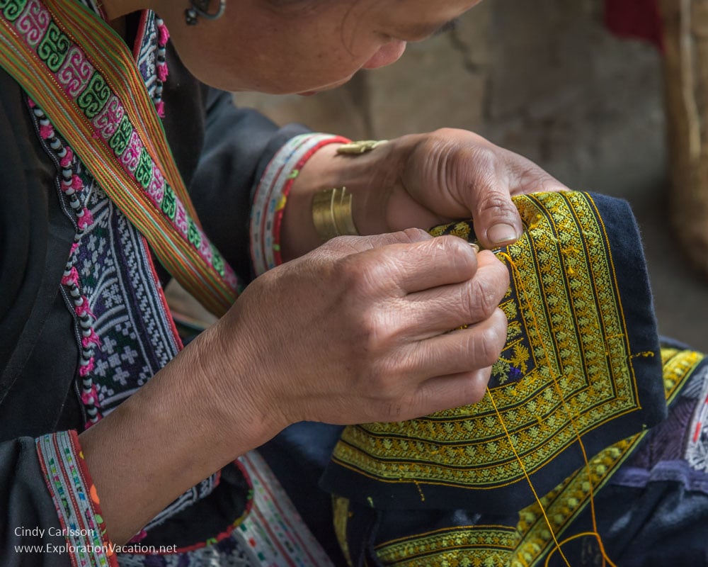 Red Dao woman sewing