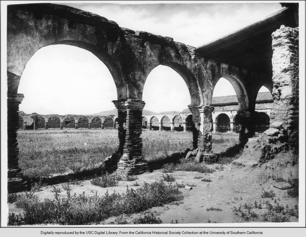 remains of arches around the plaza