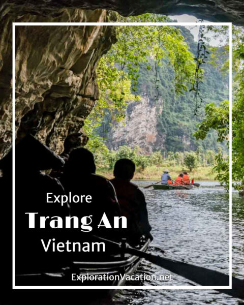 photo of a rowboat leaving a cave with text "Trang An Vietnam"