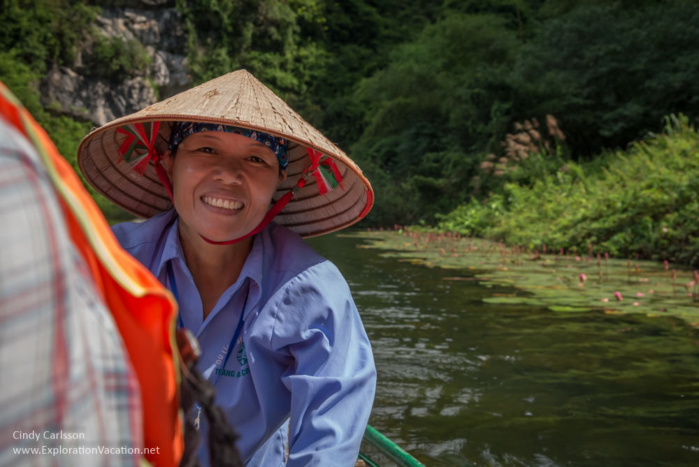 photo of a row boat rower in Trang An Vietnam - www.ExplorationVacation.net