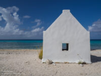 Historic salt worker hut along the beach on Bonaire - Explorationvacation.net
