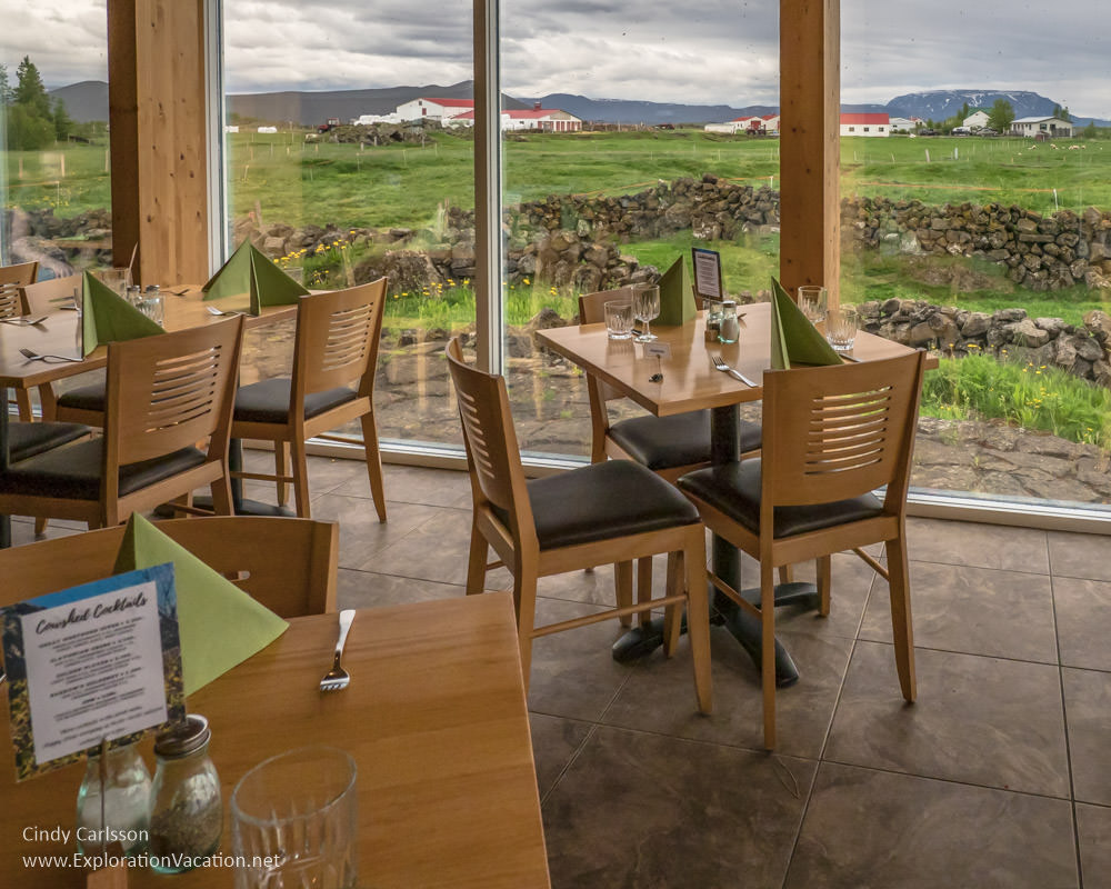 dining tables with a view of green fields