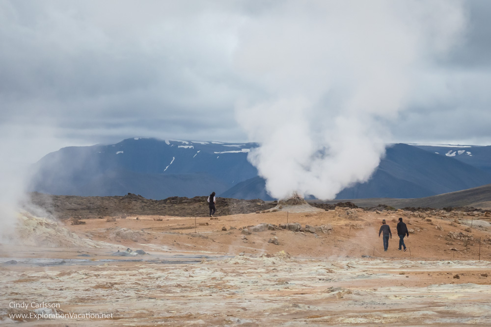 view of steaming vent with people watching