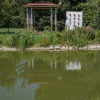 Asian pavilion reflected in a pond
