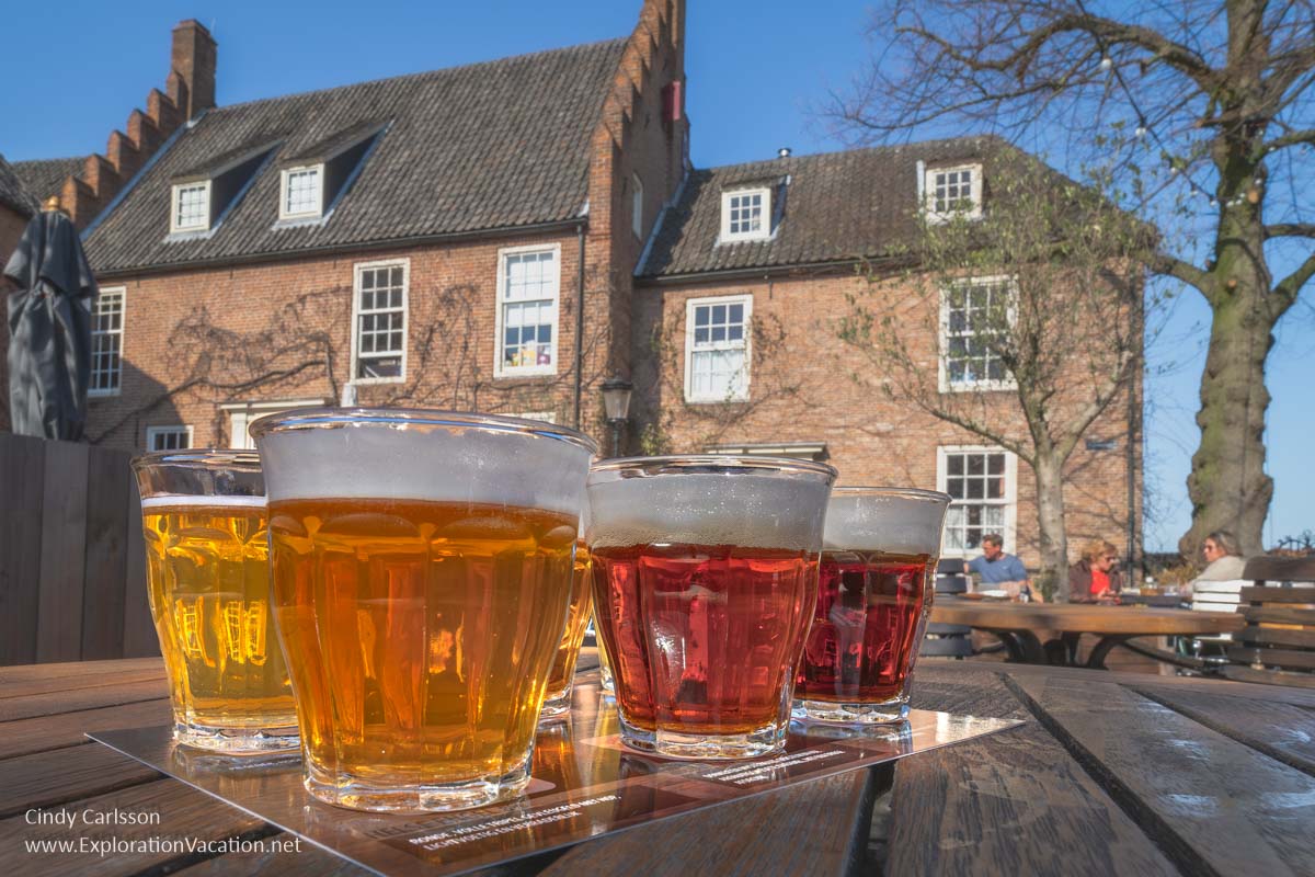 Photo of a beer flight in the courtyard of De Hemel (Heaven) Brewery in Nijimegen, Netherlands. (Photo &copy; Cindy Carlsson at ExplorationVacation.net)