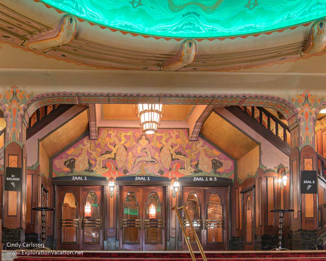 Photo of the lobby and theater doors of the Pathe Tuschinski Theater in Amsterdam Netherlands. (Photo &copy; Cindy Carlsson at ExplorationVacation.net)