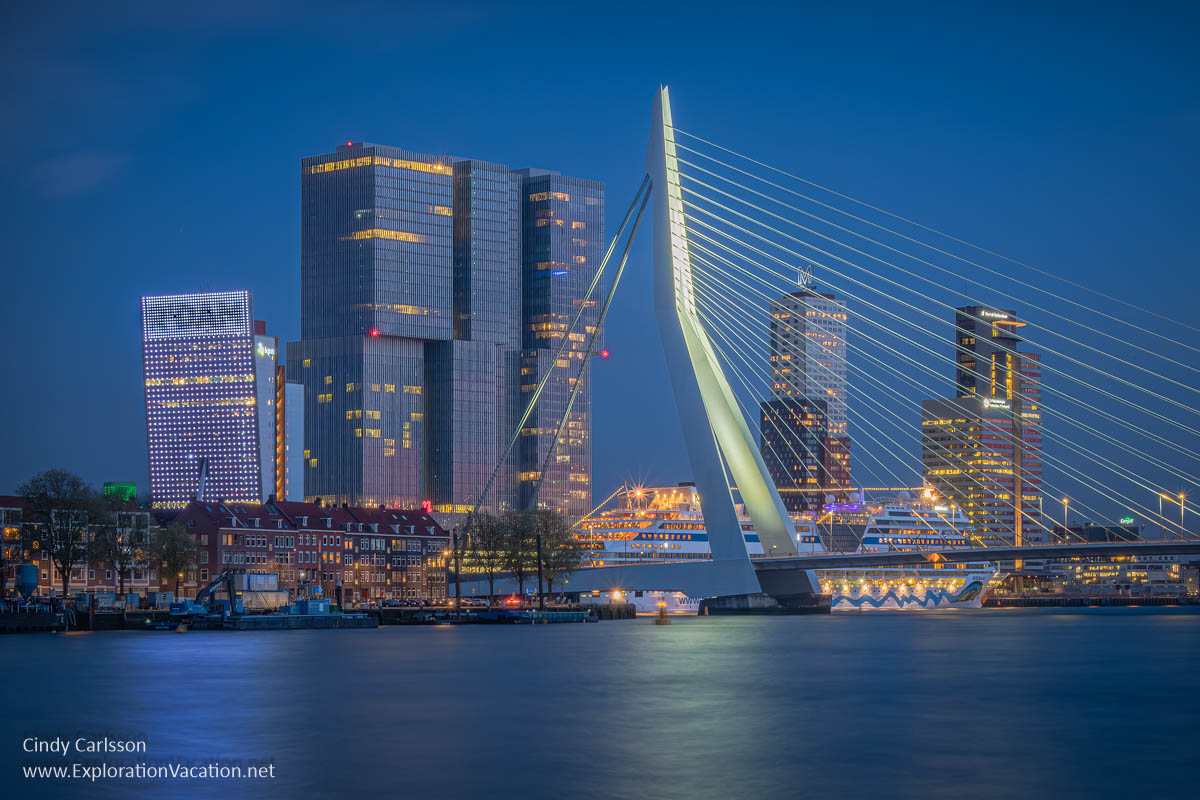 Photo of modern towers and the Erasmus Bridge at twilight. (Photo &copy; Cindy Carlsson at ExplorationVacation.net)