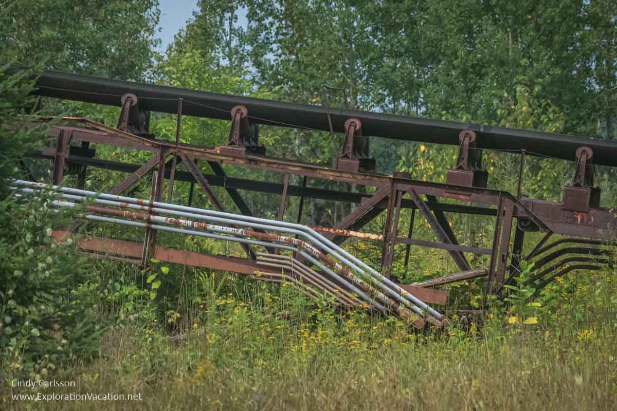 rusty portion of an old conveyor used to move ore and waste rock around the mine