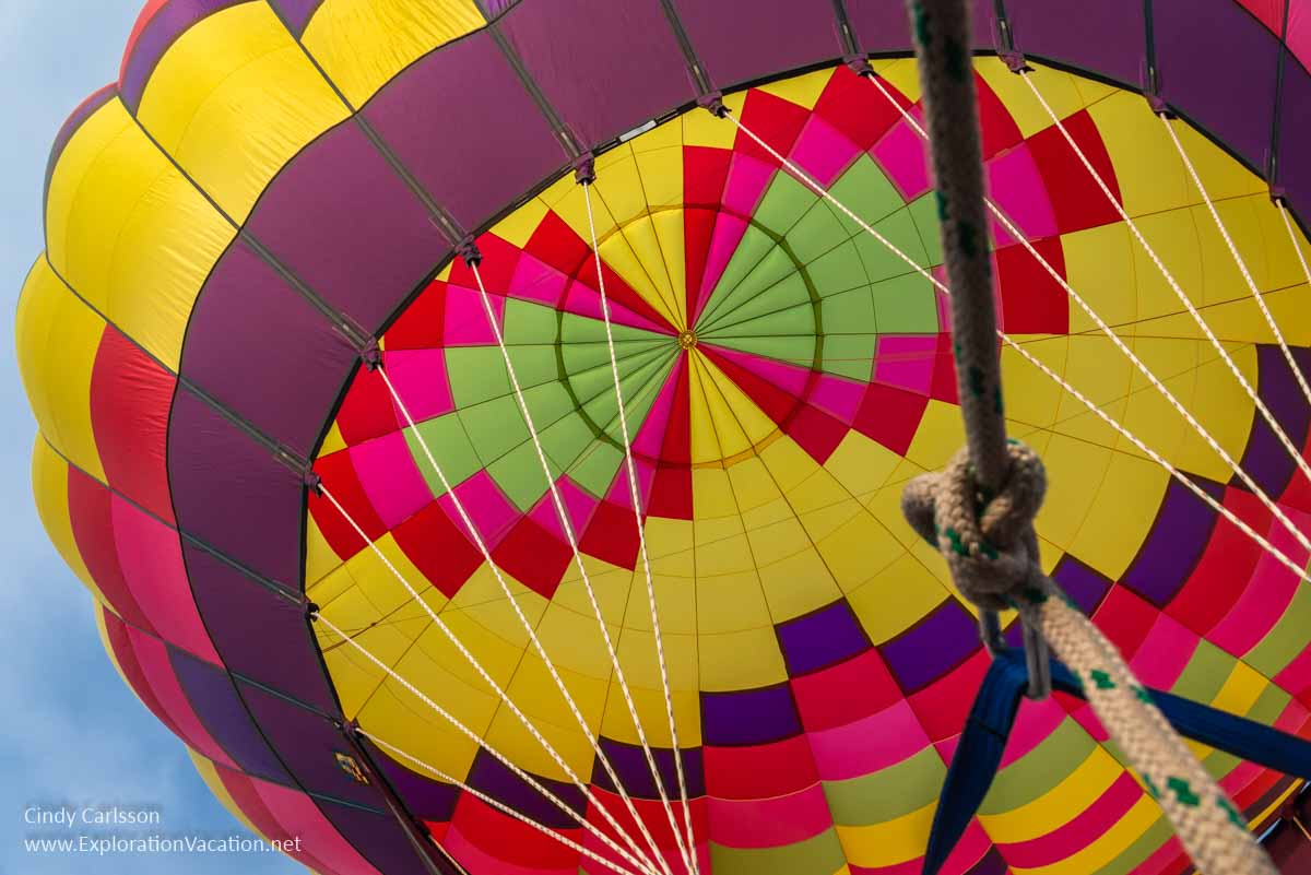 looking up into a colorful balloon