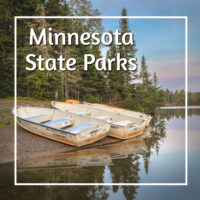small boats on a lake shore with text "Minnesota State Parks"