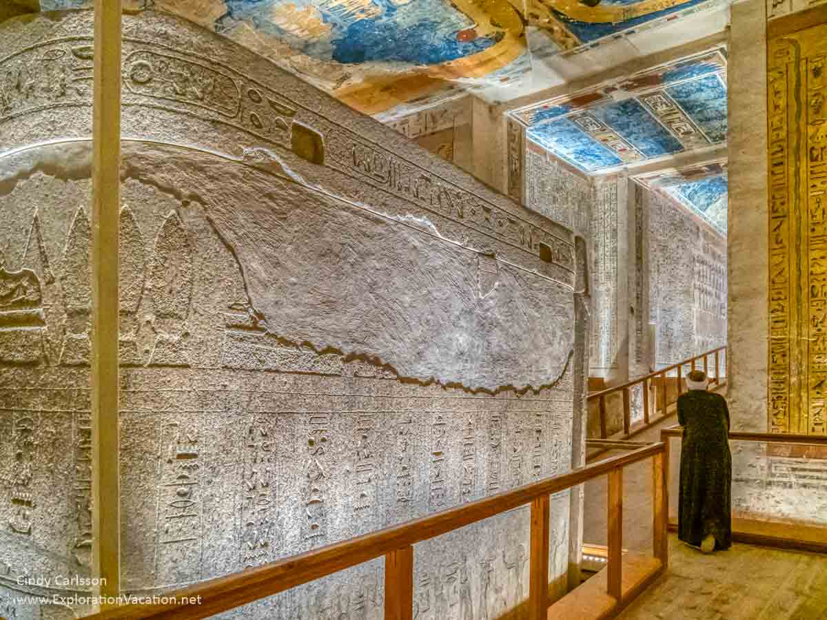 close-up of a huge stone sarcophagus in a colorful tomb