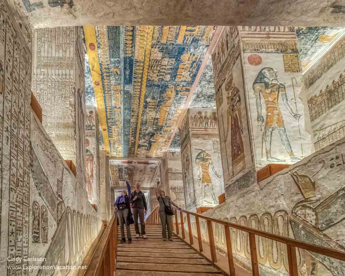 people iside a colorful tomb
