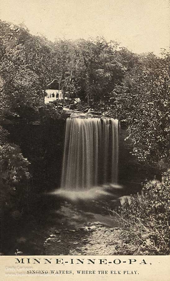 postcard with a double waterfall and text "Minneinneopa Park Hotel: Singing waters, where the elk play"