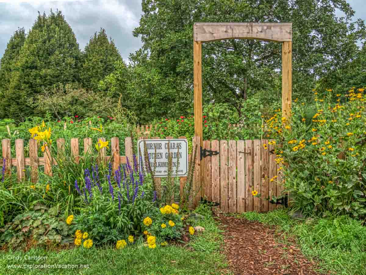 fence and sign by a garden