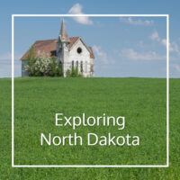 prairie with abandoned church and text "Exploring North Dakota"