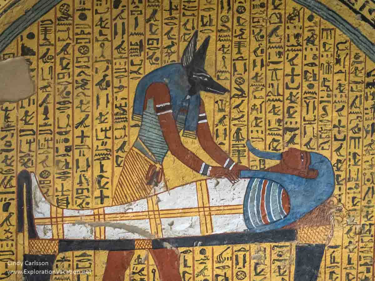 painting of Anubis tending to the mummy of Amennakht in an Egyptian tomb