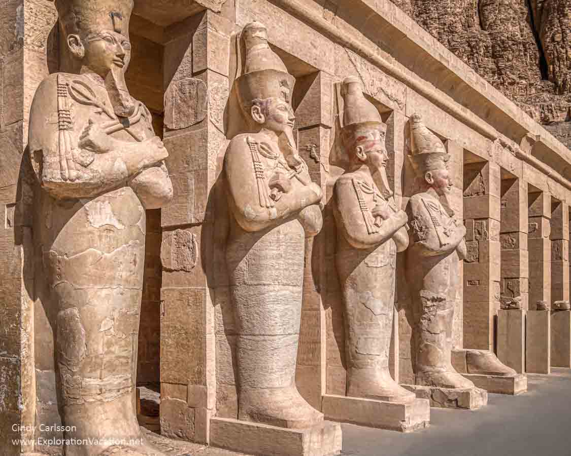 photo of monumental sculptures of an Egyptian pharo