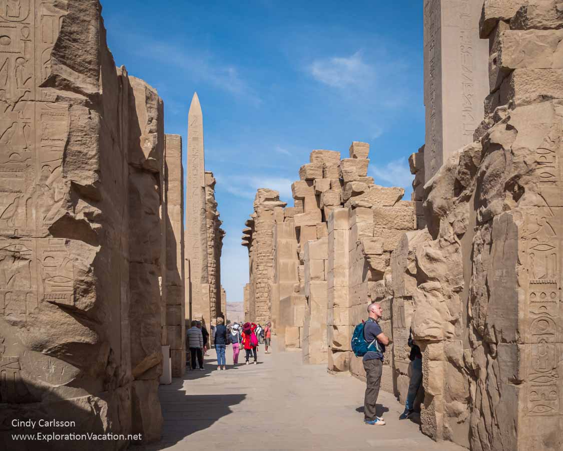 photo of Karnak Temple ruins with obelisk