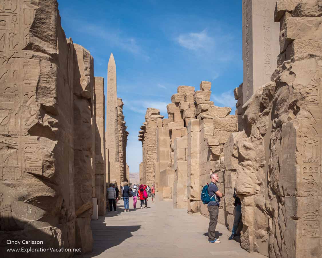 photo of Karnak Temple ruins with obelisk