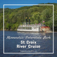 paddlewheel boat on a river by a forested hillside with text "Minnesota's Interstate Park St Croix River Cruise"