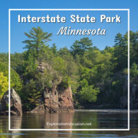 forested cliffs along a river with text "Interstate State Park Minnesota"