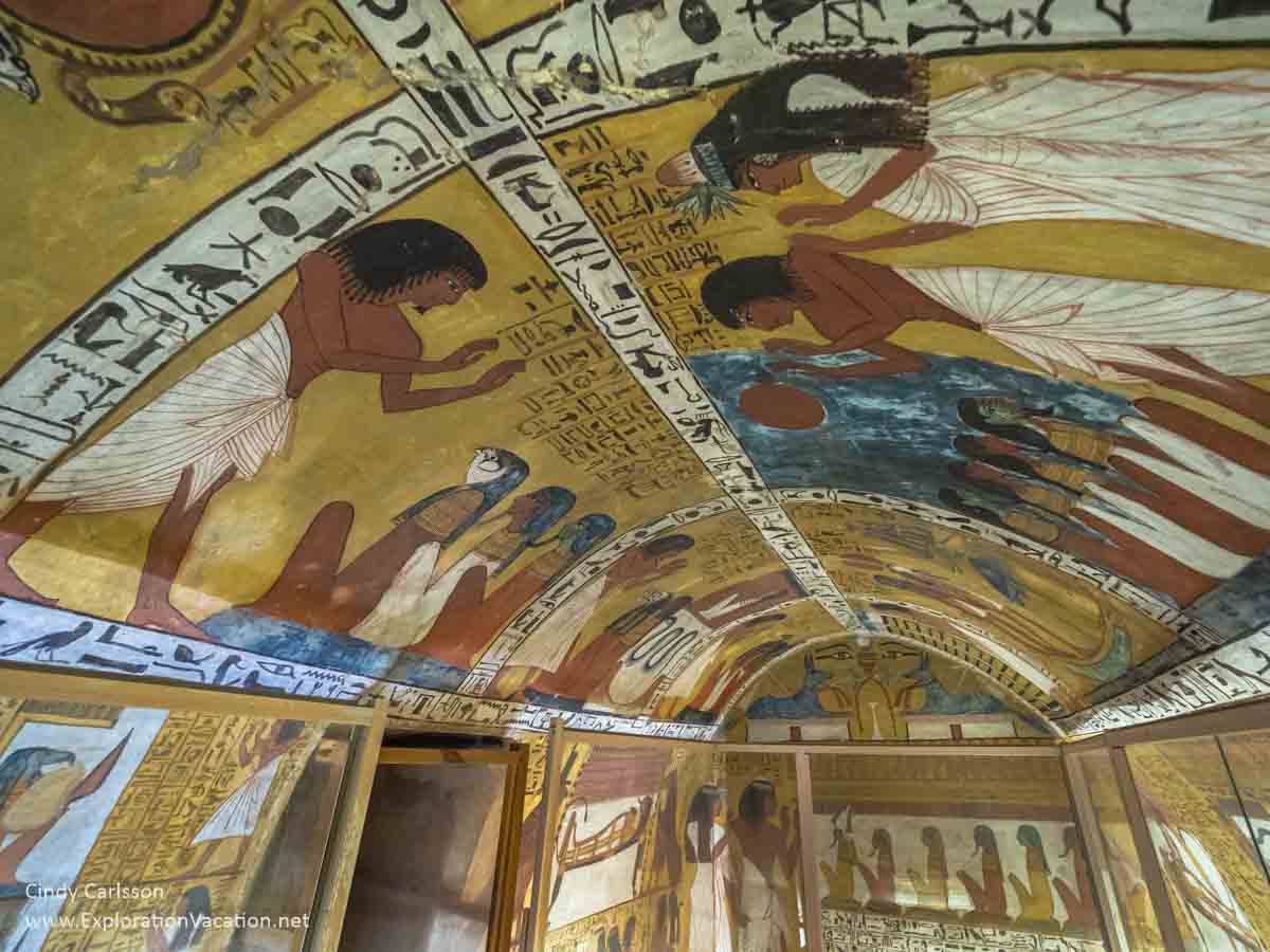 photo of interior of a small, brightly painted Egyptian tomb