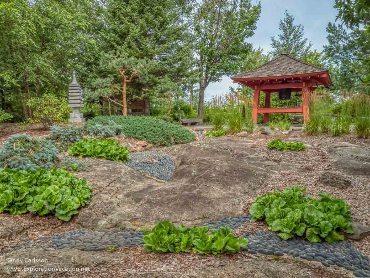 Japanese garden with rocks and bell tower