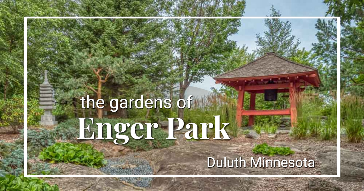 Bell tower in a Japanese garden with text "the gardens of Enger Park Duluth Minnesota"