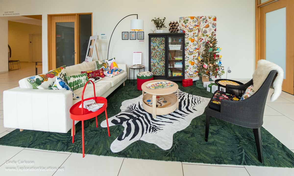 small seating area with colorful scandinavian soft furnishings