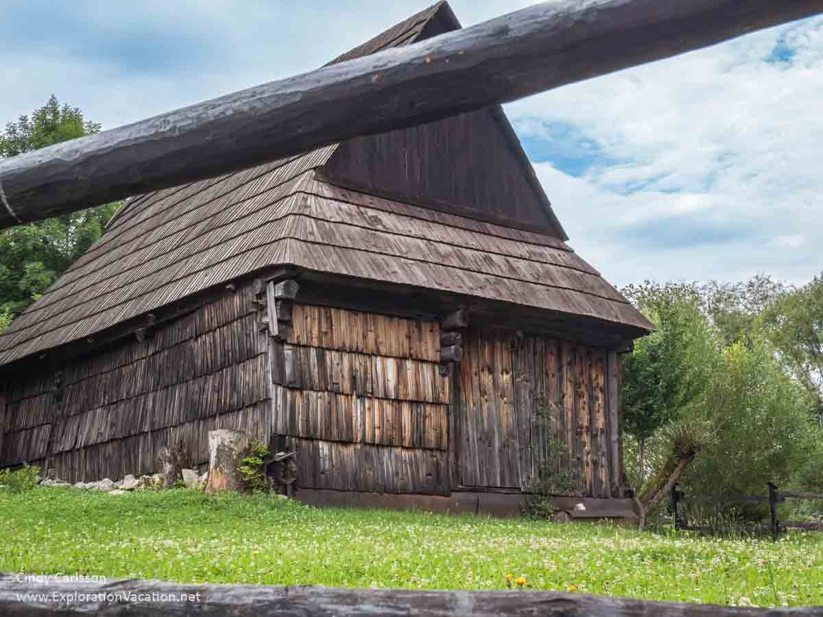 photo of a traditional wooden barn with wood shingle siding