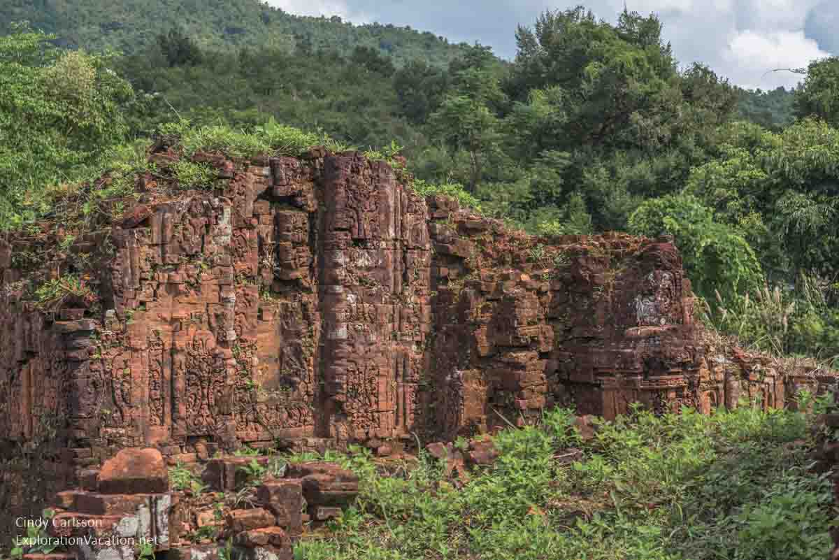 lower level of a carved brick wall