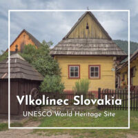 traditional wooden mountain house with text "Vlkolinec Slovakia UNESCO World Heritage site"