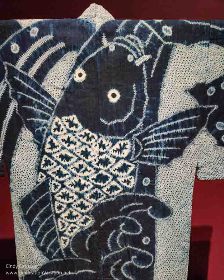 Photo of part of a shibori- dyed Japanese kimono with a carp on display in Dressed by Nature: Textiles of Japan at the Minneapolis Institute of Arts (Mia) in Minnesota © Cindy Carlsson - ExplorationVacation.net